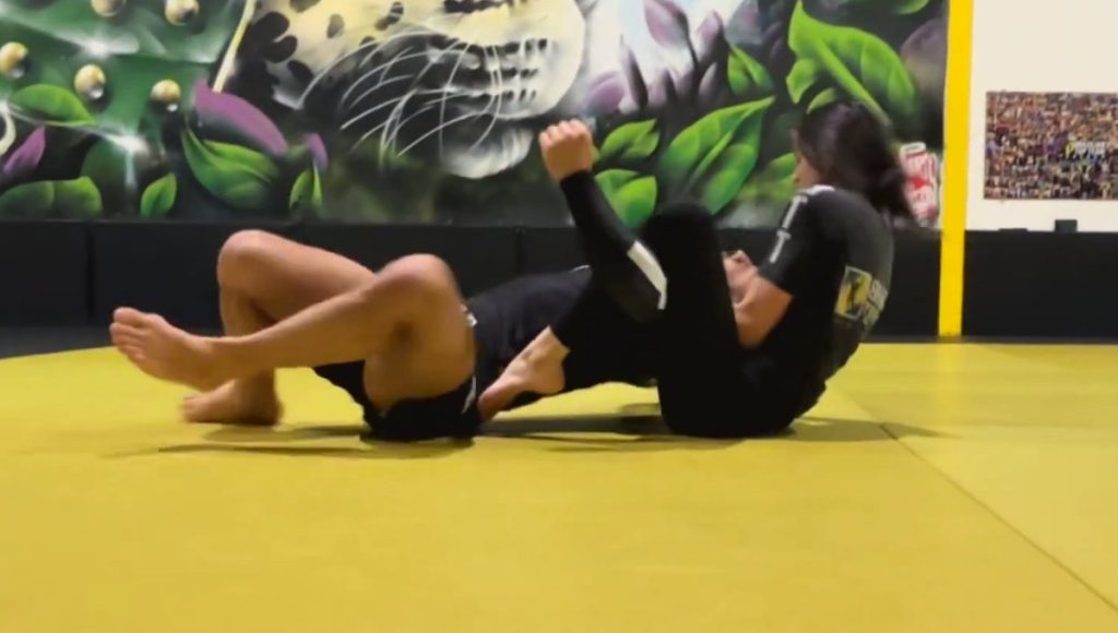 Up and coming teenagers Evalyn and Coach Gus training — BJJ technique at Banzai Jiu-Jitsu
